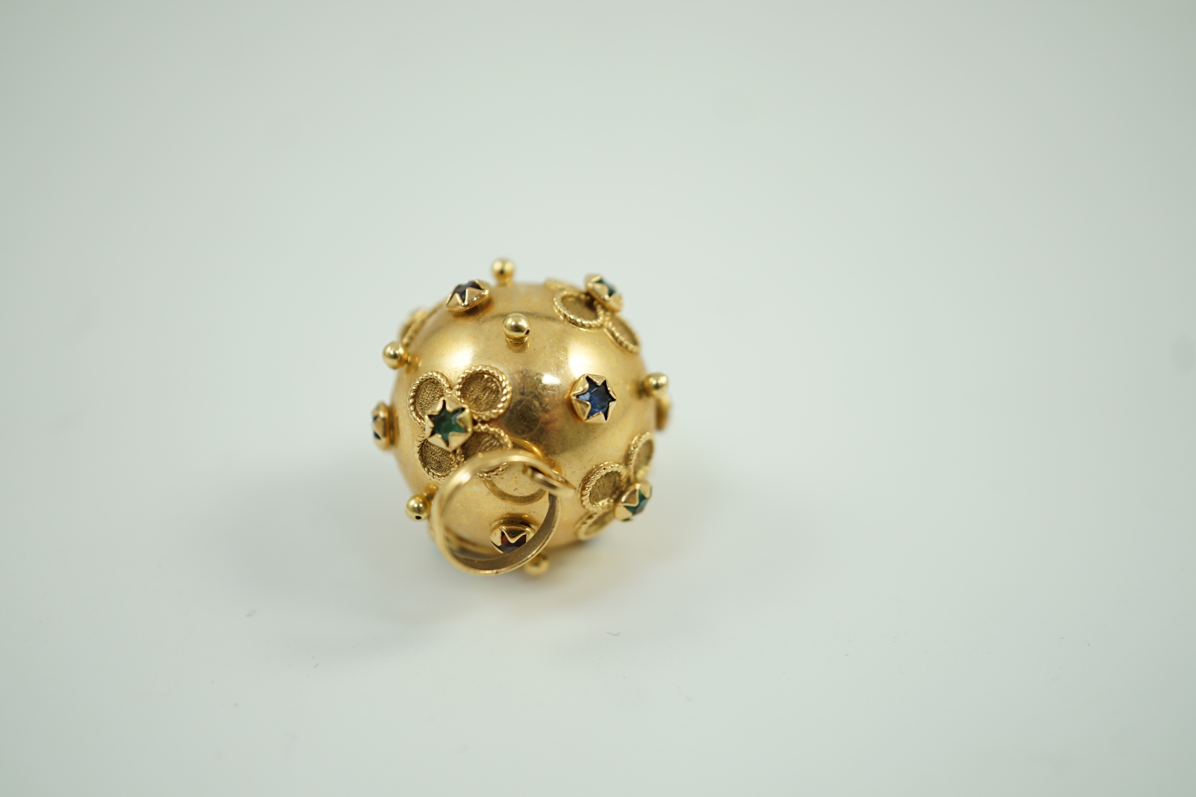 A modern Italian 750 yellow metal and gem set globular pendant, 26mm, gross weight 8.1 grams.